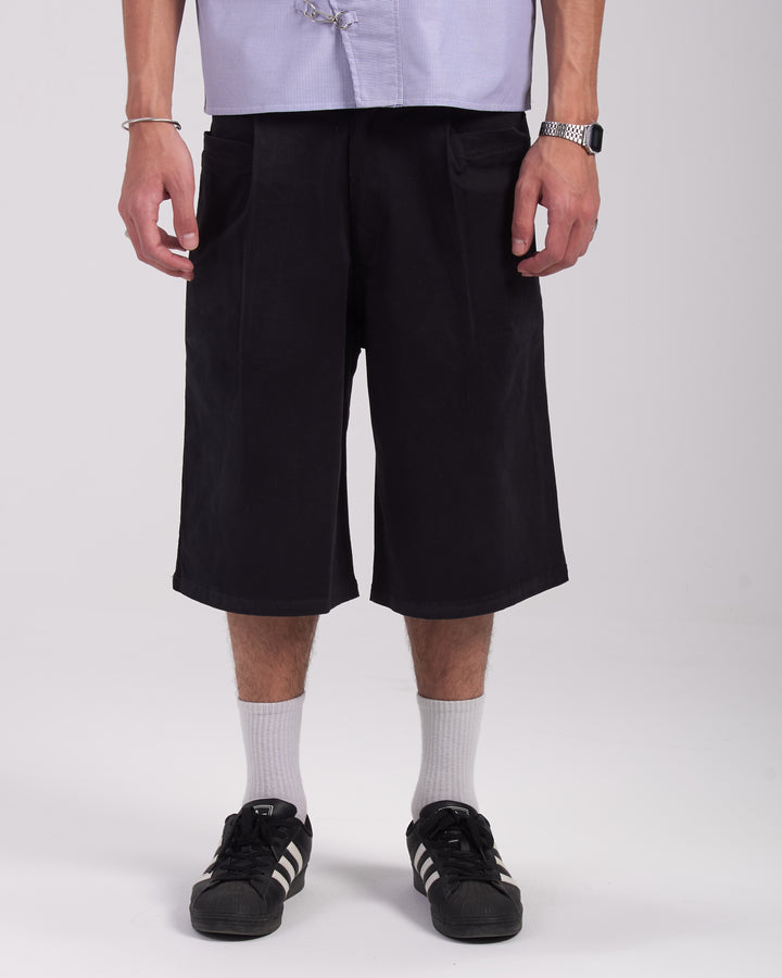 Black pleated shorts