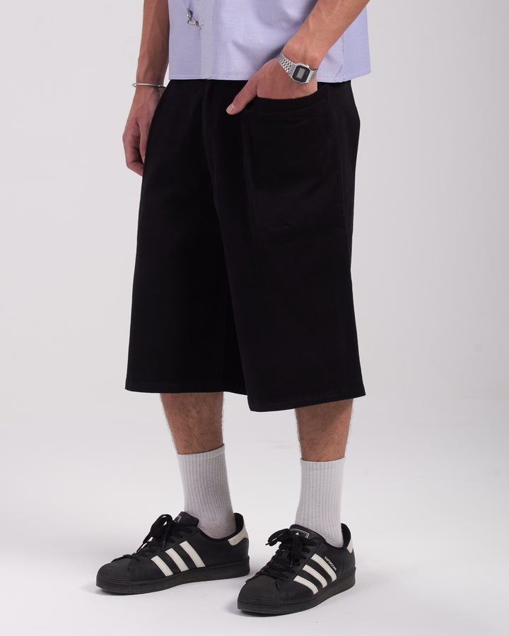 Black pleated shorts