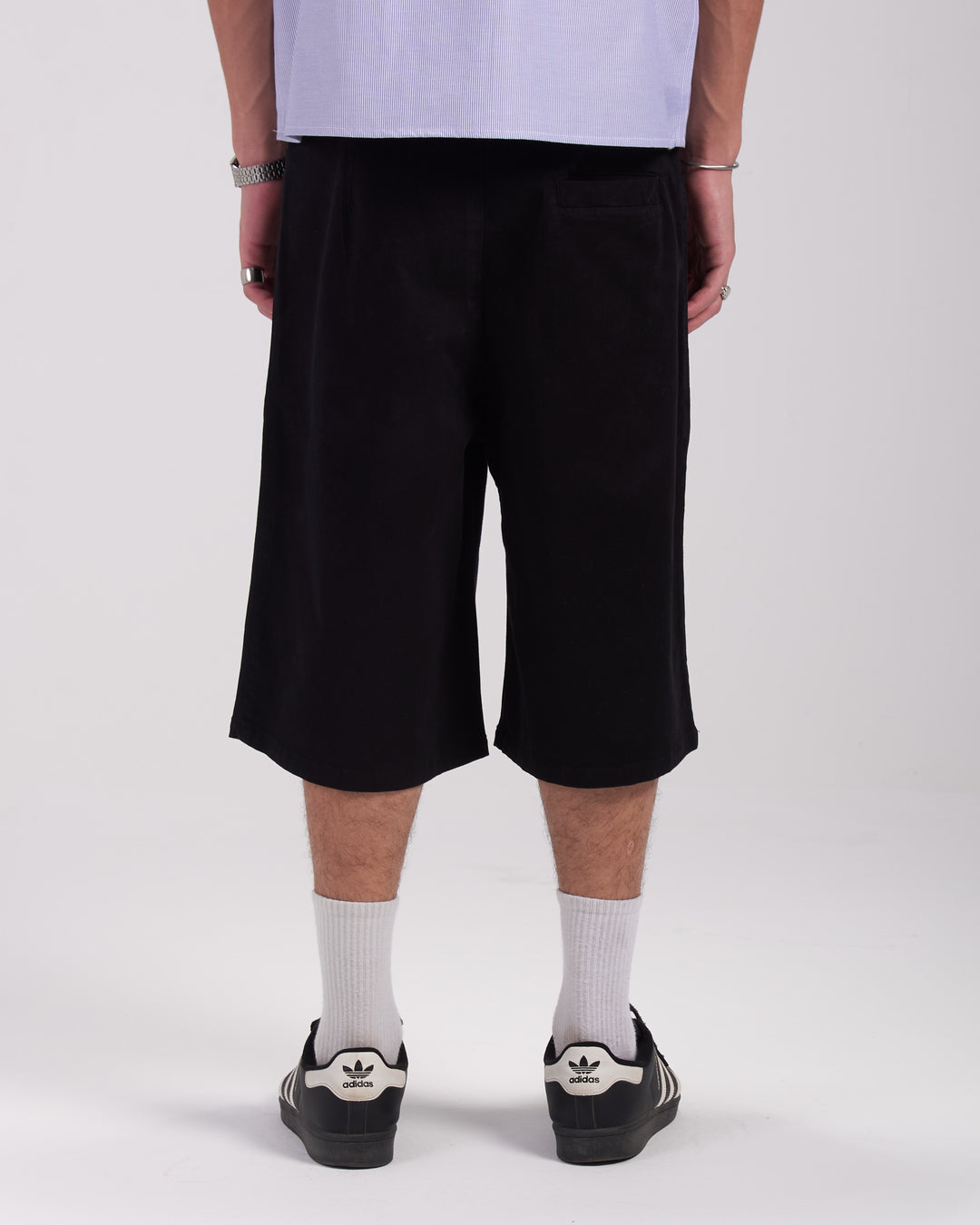 Black pleated shorts