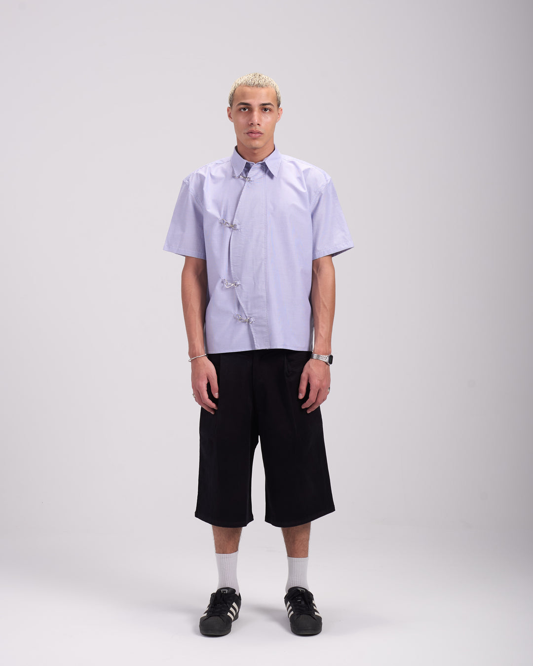 Black pleated shorts
